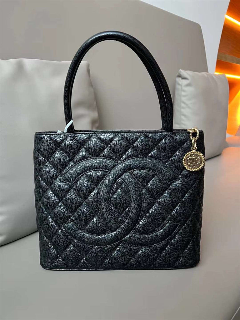 Chanel inspired Caviar Medallion Tote in black bag